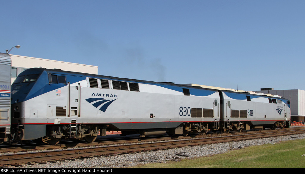 AMTK 830 & 818 lead train P052 out of town in a rare daylight move